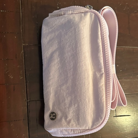 lululemon athletica Handbags - lululemon athletica Light Pink Wristlet